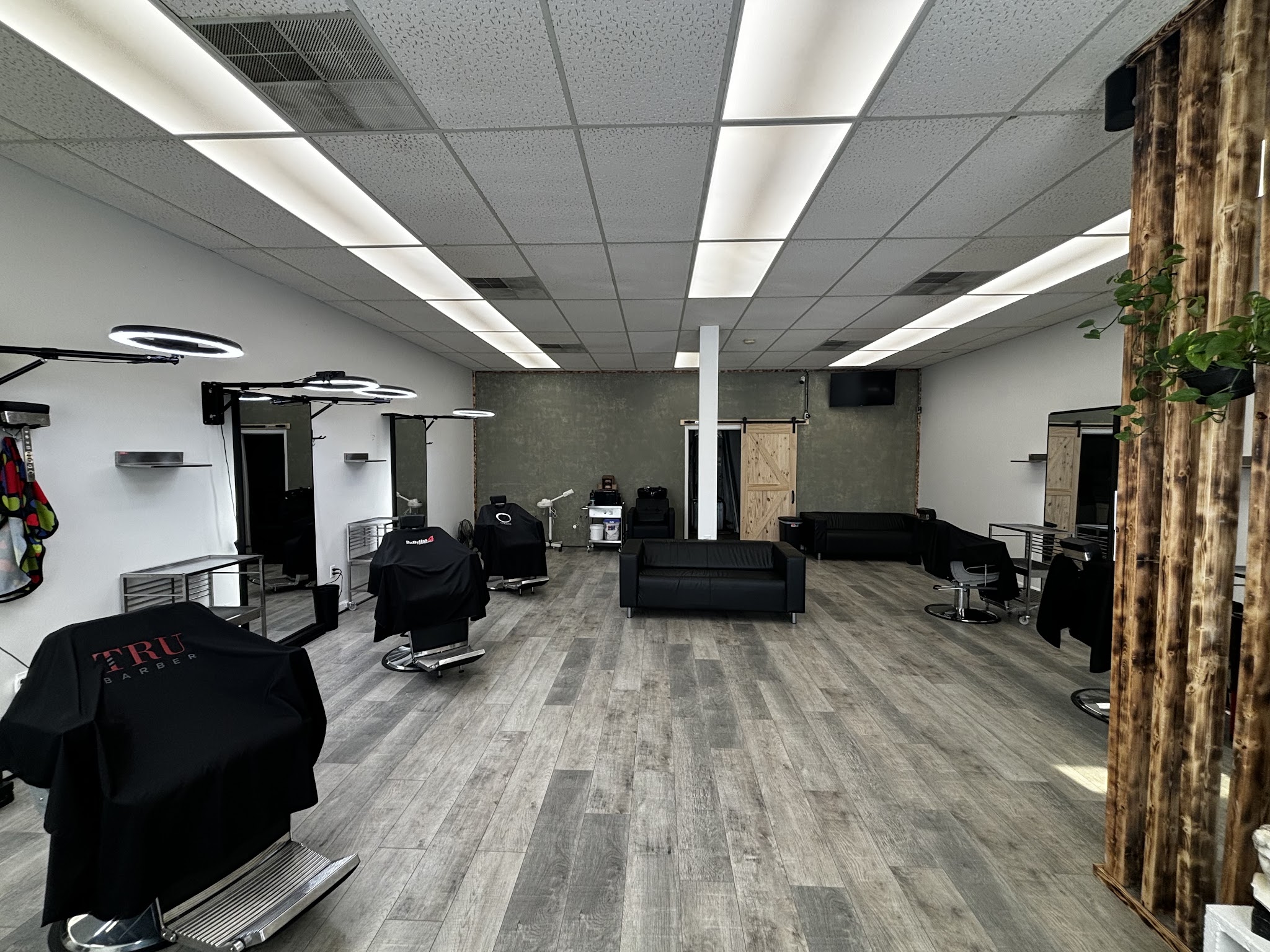 Wide view of the shop floor with chairs and seating